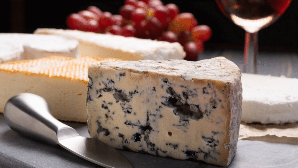 Blue cheese and Pepper Jack with a glass of Zinfandel wine